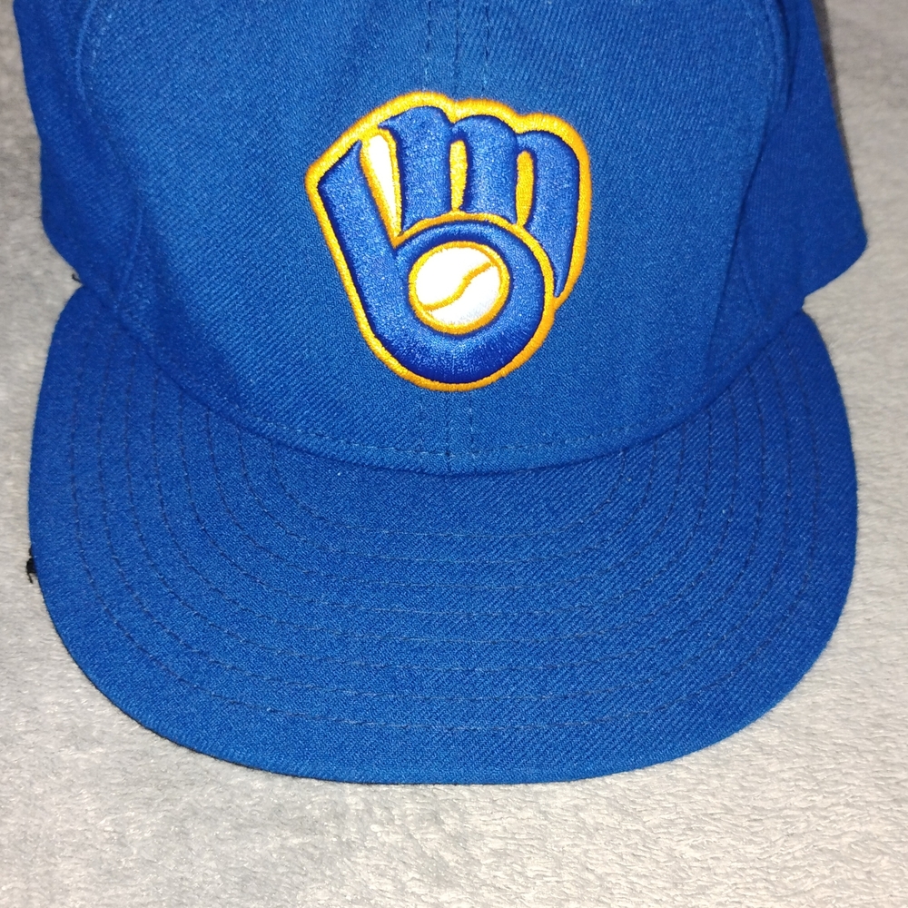 Others Follow Blue Cap with Gold Logo